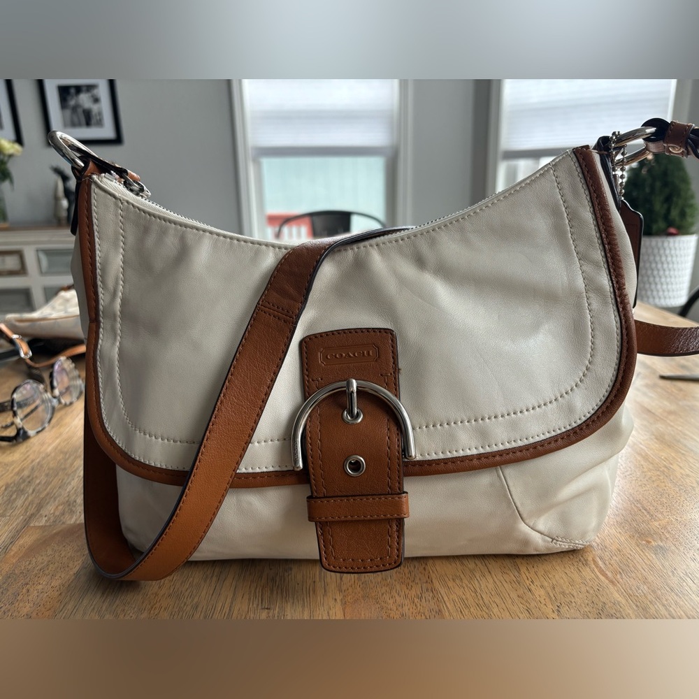 Coach 2012 Hampton/Soho bag. Clean pink inside. Good condition.
